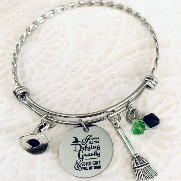 I think ill try Defying Gravity Wicked inspired charm  stainless steel bracelet - Picture 1 of 1